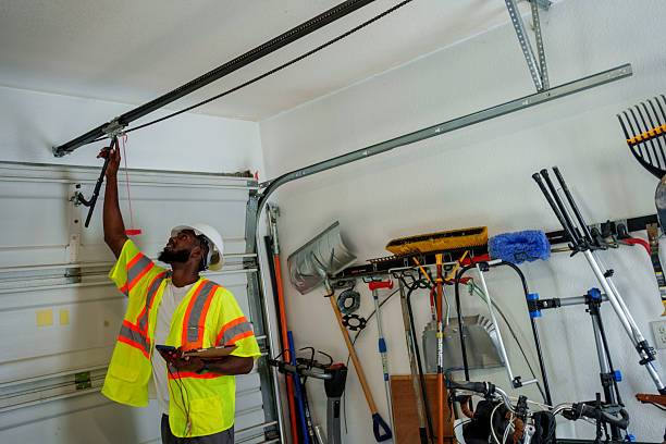 Professional Garage Door Panel Replacement technician working in Brazos County County, TX